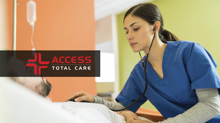 a nurse offering immediate care to a patient lying in an urgent care bed